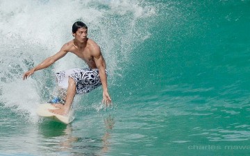 Surfing at the Mid Reef Point, Tunku Abdul Rahman Parks Surfing at the Mid Reef Point, Tunku Abdul Rahman Parks
